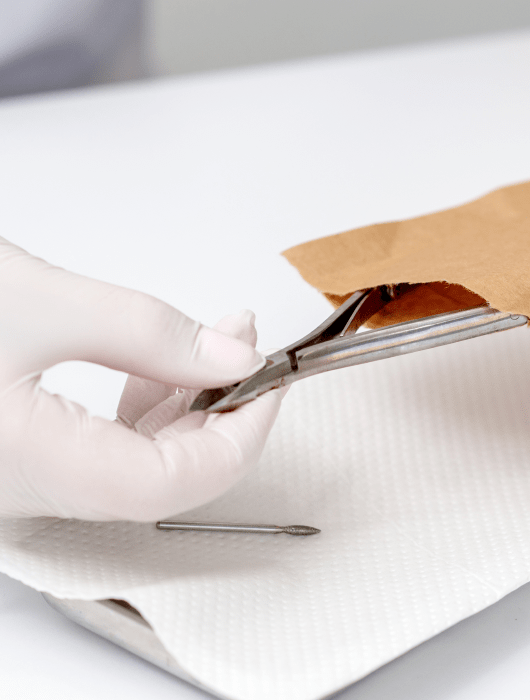 Did Short Nails Entered The Trend Again? E6304899 Hands Are Taking Manicure Tools From Craft Envelope Before Manicure Procedure 2 Min
